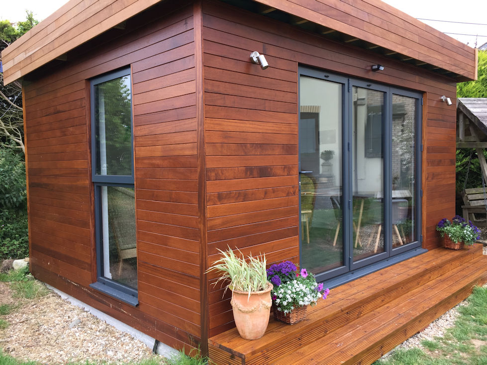 Garden room with bi-fold doors, hard wood cladding and insulated