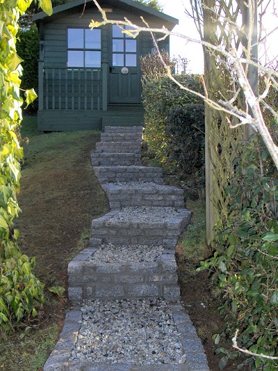 Steps made using reclaimed granite setts & granite chippings.