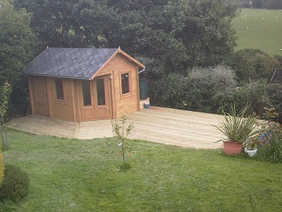 Log cabin and deck patio.