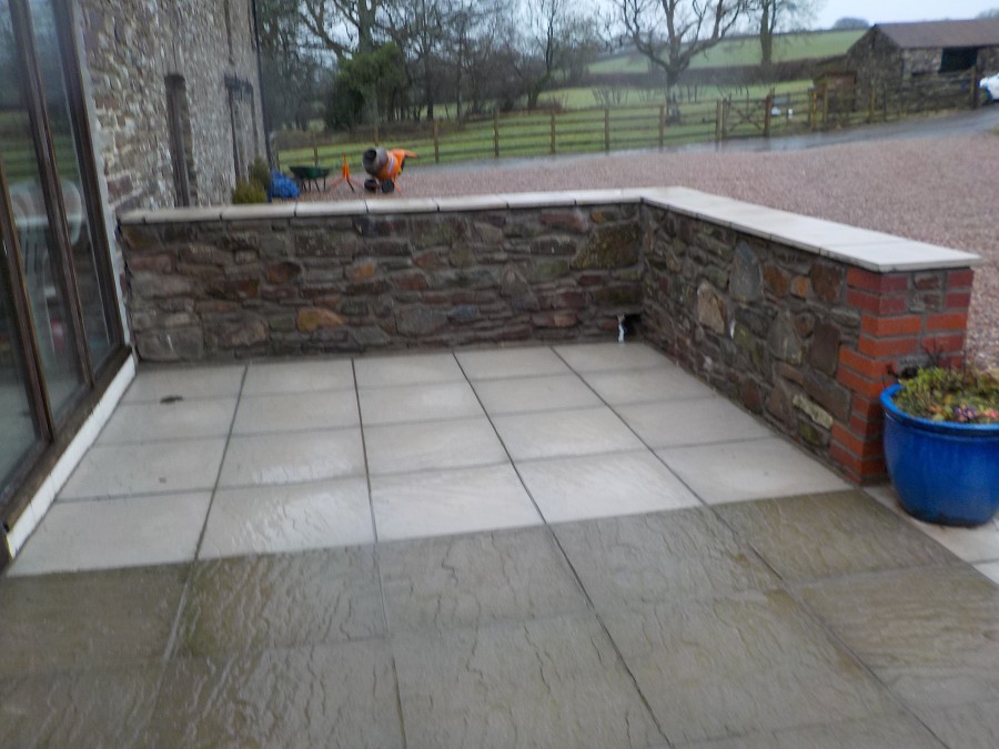 Patio extension with new stone wall